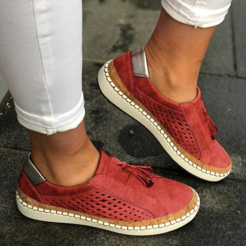 Red cushioned comfort slip-on shoes