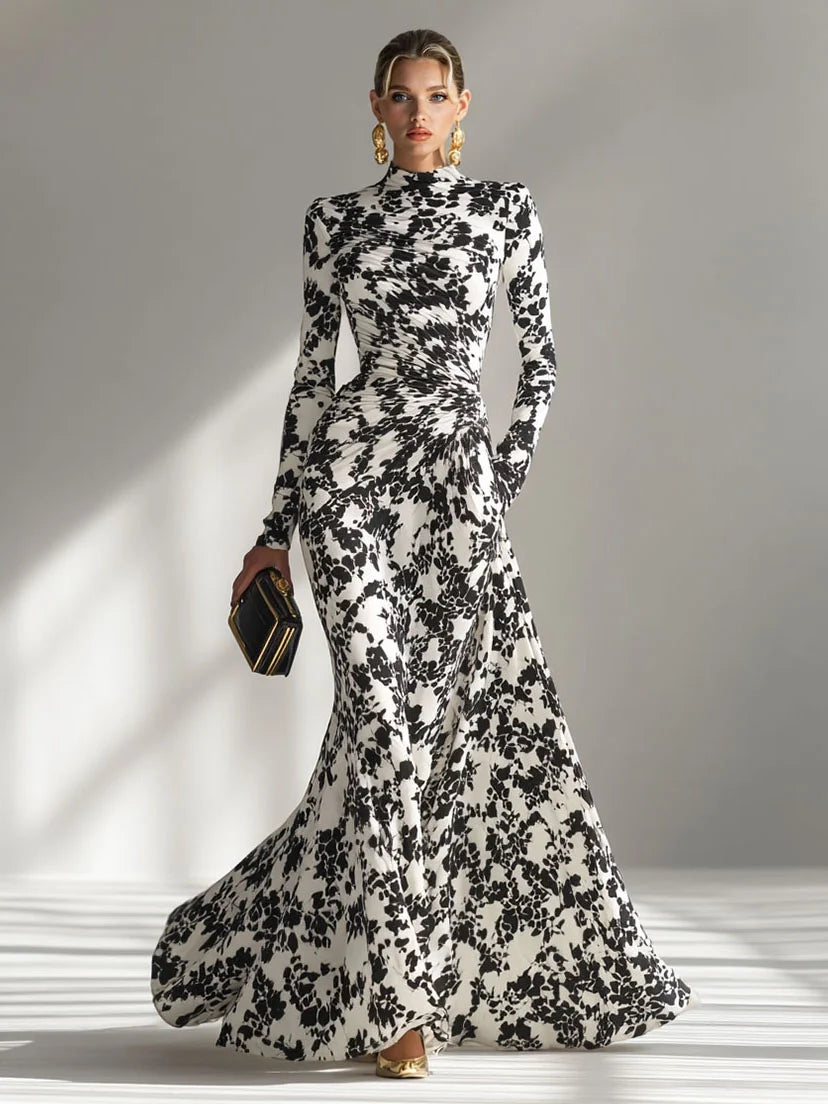 Model wearing the abstract floral mermaid maxi dress in Red
