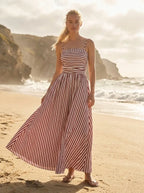 Model in striped maxi dress