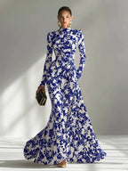 Model wearing the abstract floral mermaid maxi dress in Black