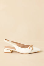 White pointed-toe slingback block heels - angled view