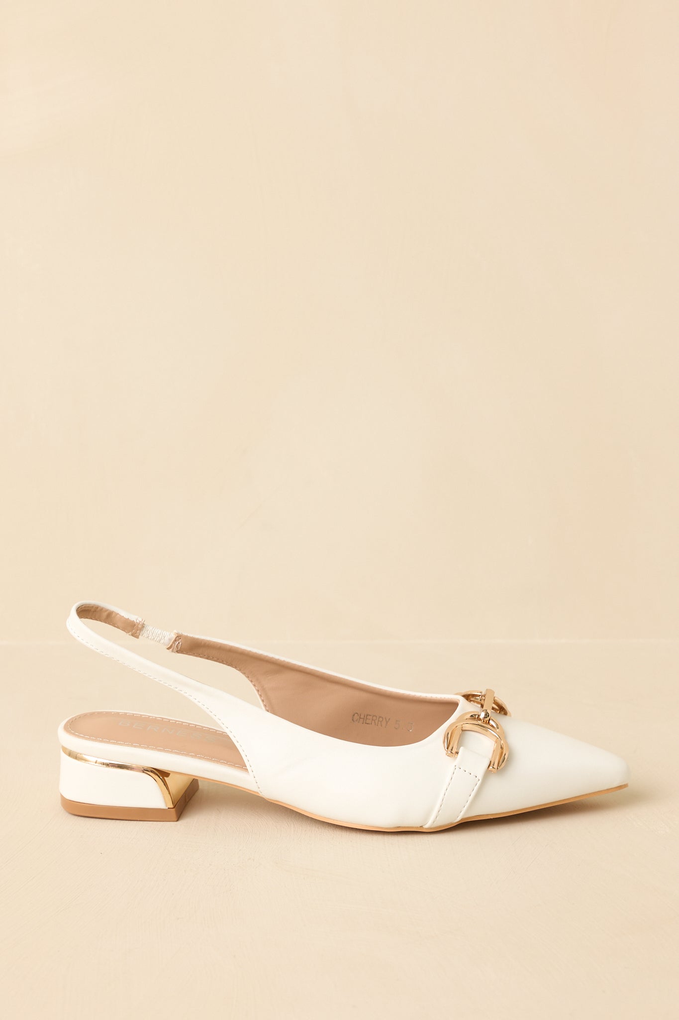 White pointed-toe slingback block heels - angled view