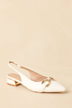 White pointed-toe slingback block heels - back slingback strap