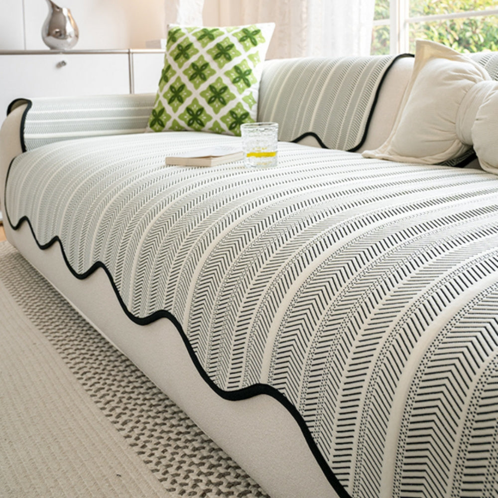 Noir Edge herringbone scallop-edge sofa cover