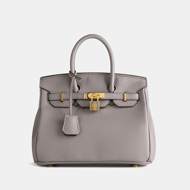 Women's Textured Handbag — Secure-Closure Shoulder Bag