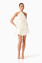 Floral trim detail on white halter mini dress