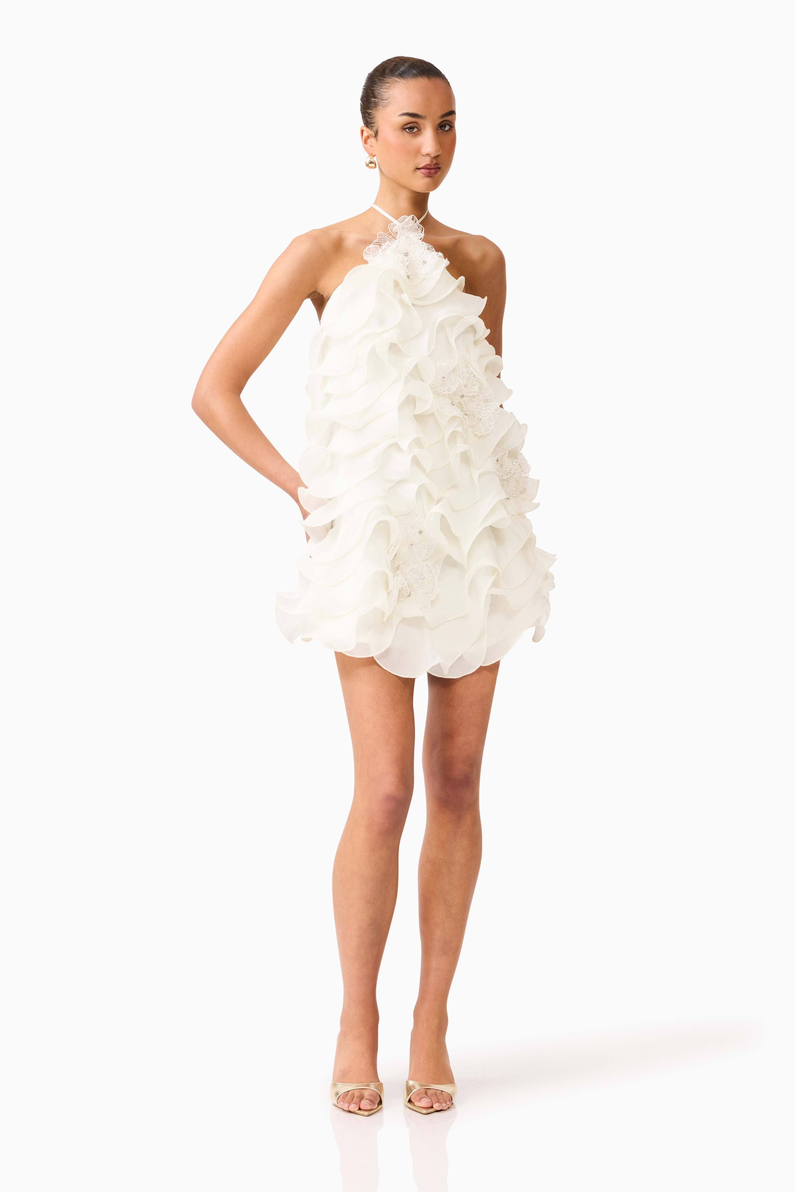 Floral trim detail on white halter mini dress