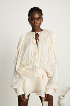 Eugénie – Long Sleeve Mini Dress with Ruffled Hem & Glitter Detail