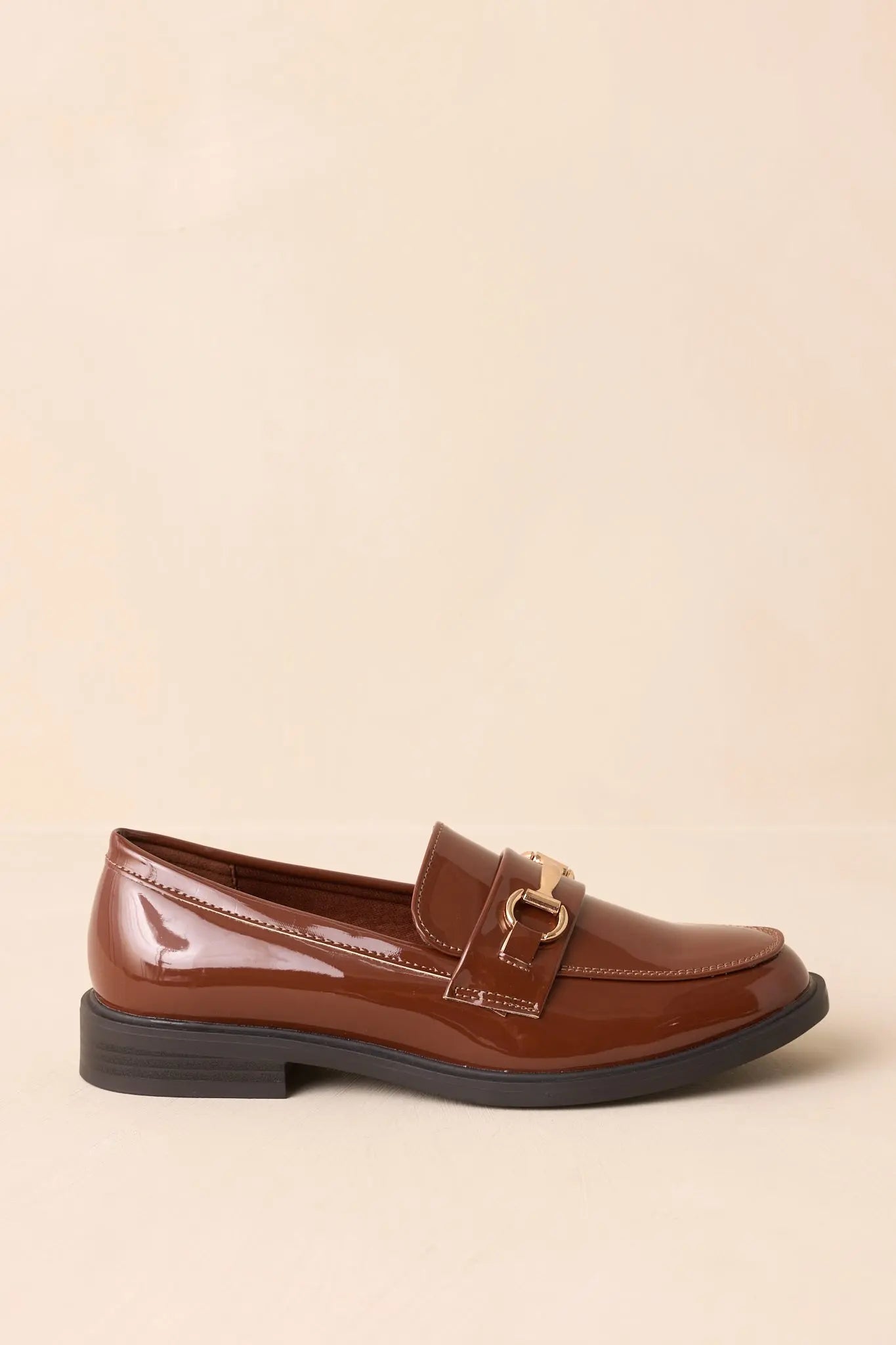 Women's It All Made Sense Brown Patent Faux Leather Loafers | Heel measures 1" 4