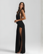 Yellow halter-neck maxi dress with open back and high slit