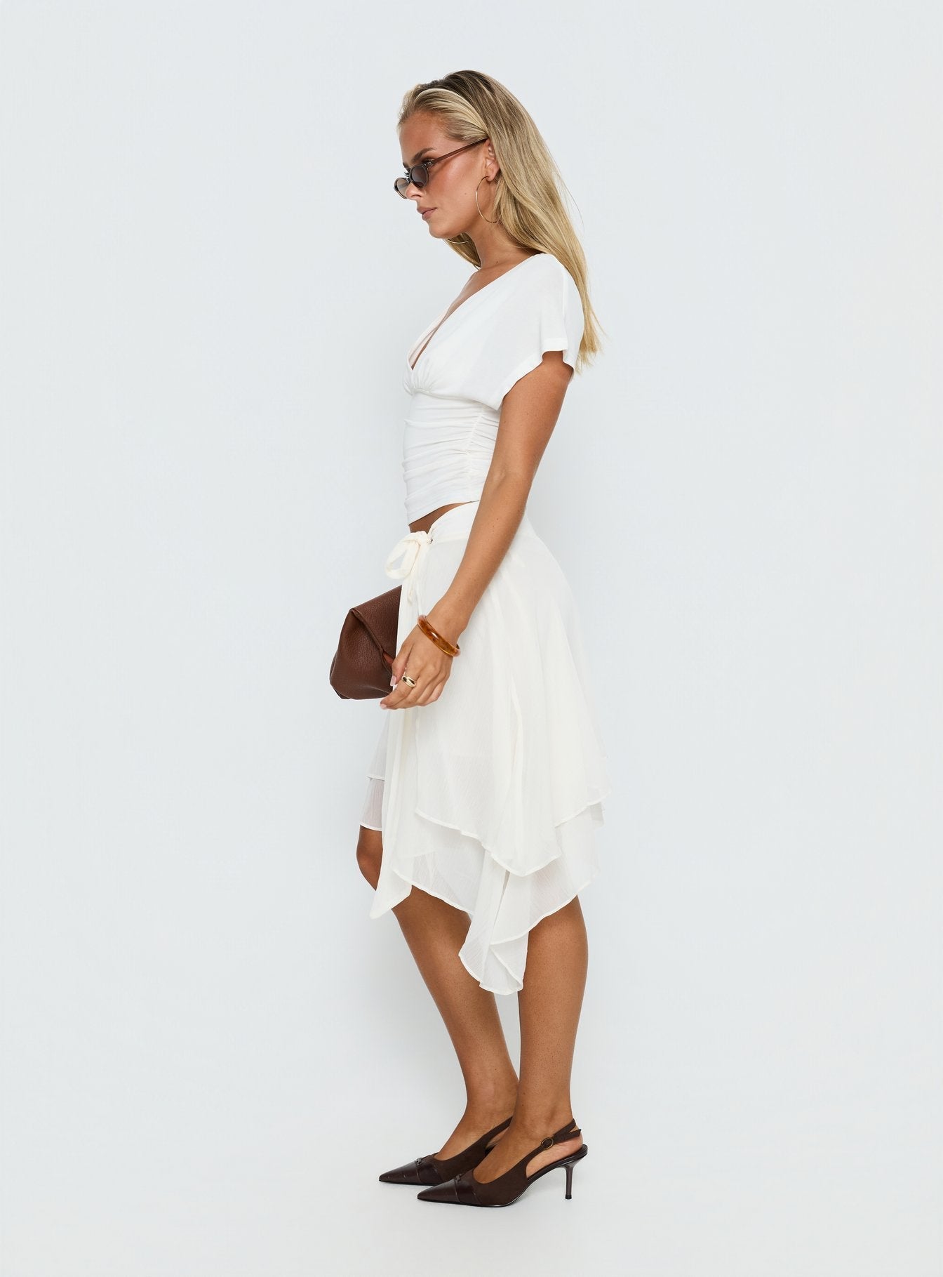 Cream chiffon midi skirt with flowy layered drape