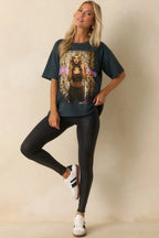 Black faux-leather shaping leggings shown on model