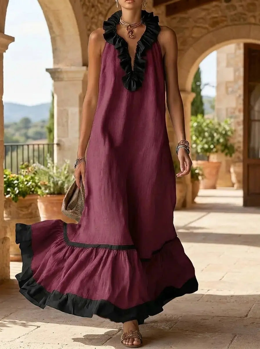 Model wearing the sleeveless V-neck ruffle-hem maxi dress